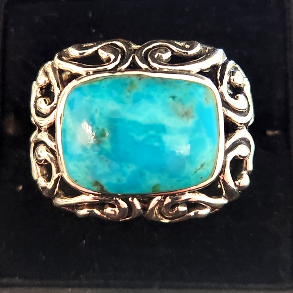 Turquoise In Silver Setting. Size 10